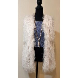 FAUX FUR VEST. You can wear open or closed. NWT
